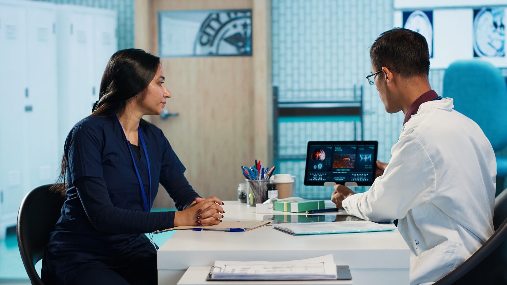 Medical expert and patient meeting at checkup appointment to discuss lab results